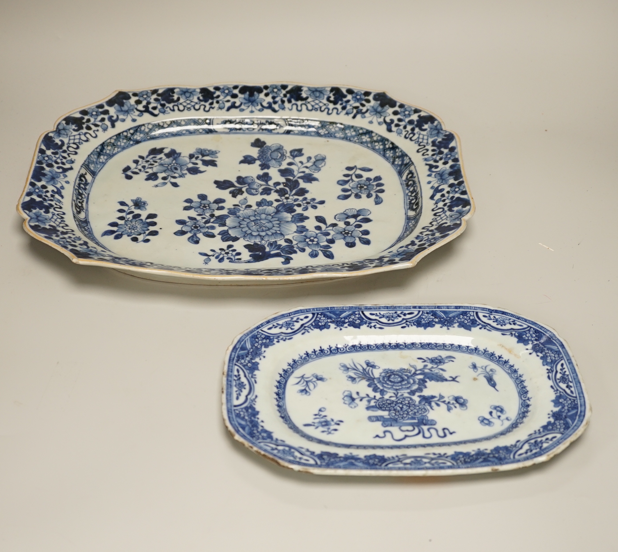 Three 18th century Chinese blue and white serving dishes and a similar plate, largest 38cm